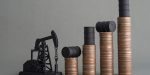 Crude oil tank on stack coin as price chart graph rising up and pump jack on grey background. World petroleum and energy industry or trading commodity investment, crude oil and gas price increase concept